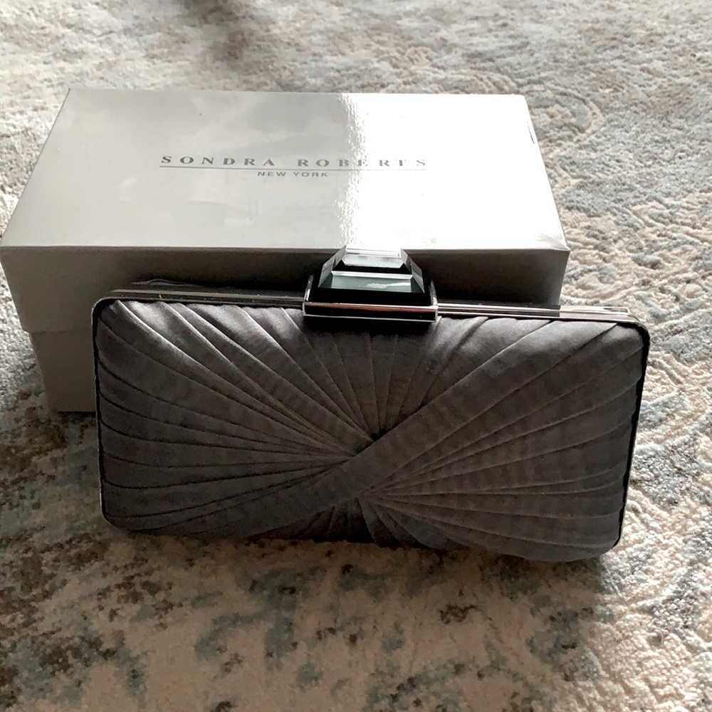Sondra Roberts clutch never used